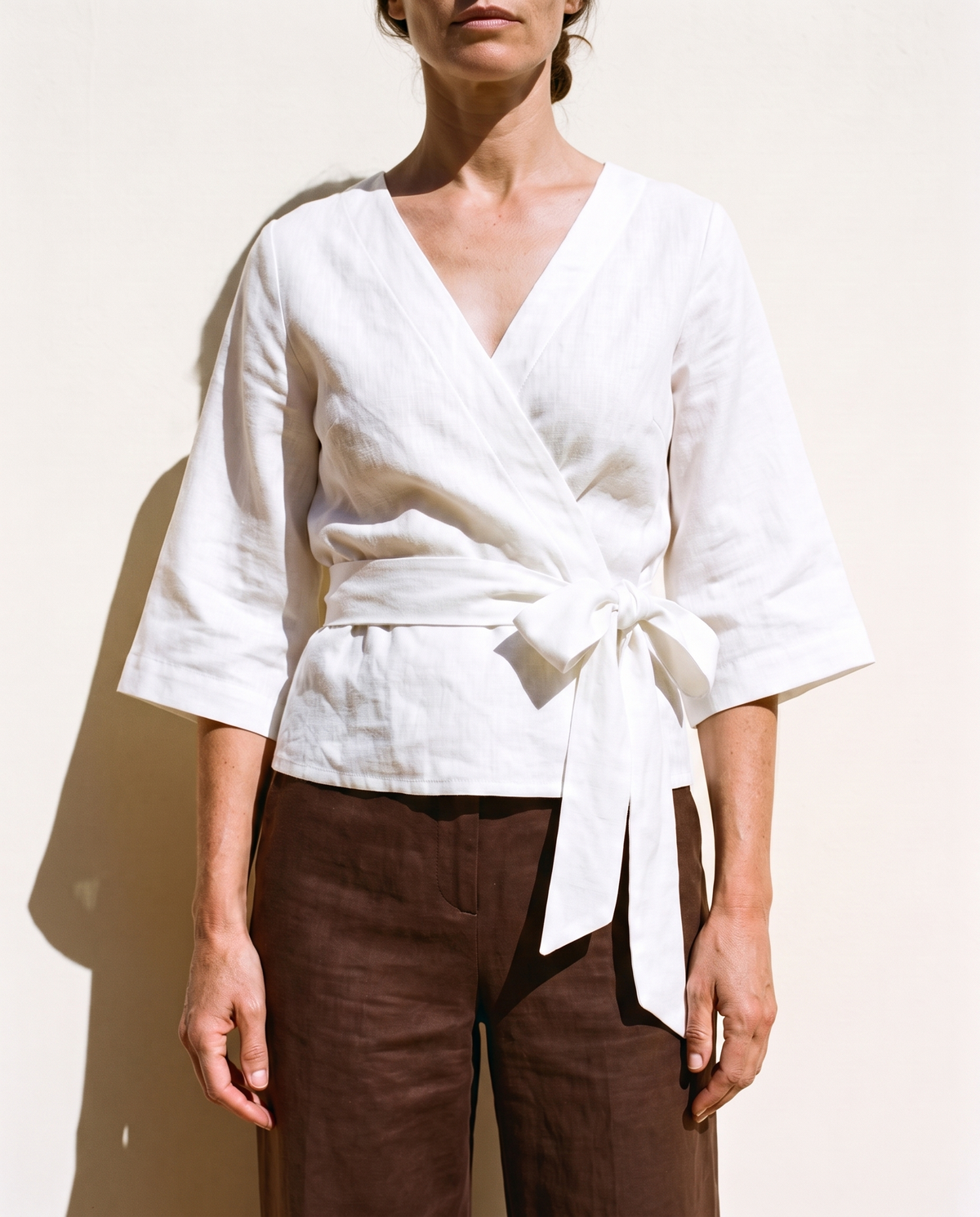 Lucia Wrap Top in white, close view of the front