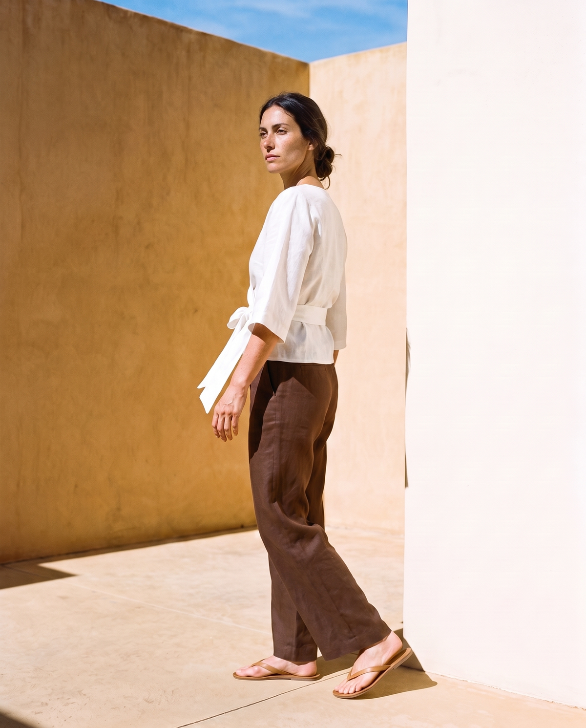 Lucia Wrap Top in white, turning away, side and back