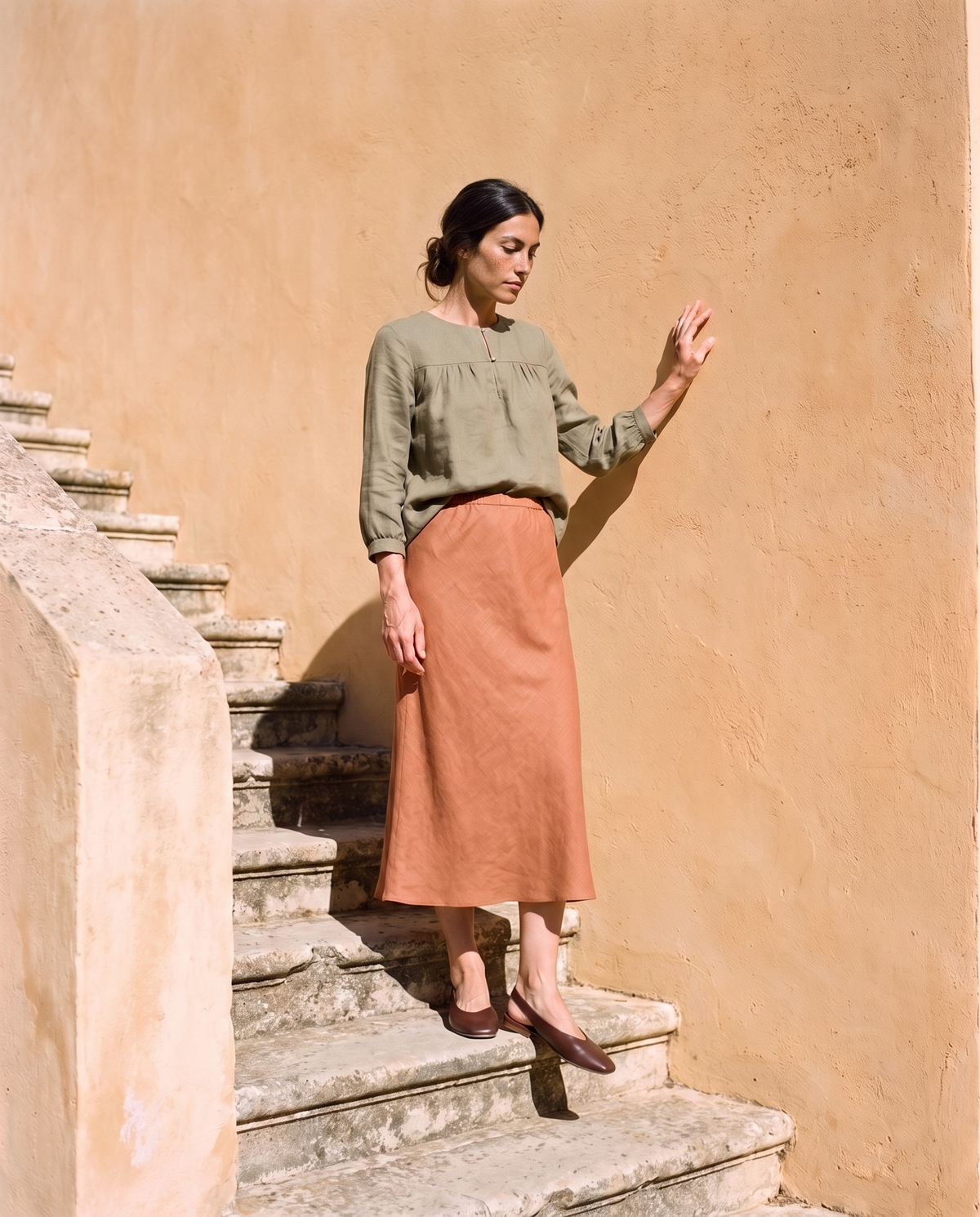 Marta Slip Skirt in clay, styled with the gathered yoke blouse