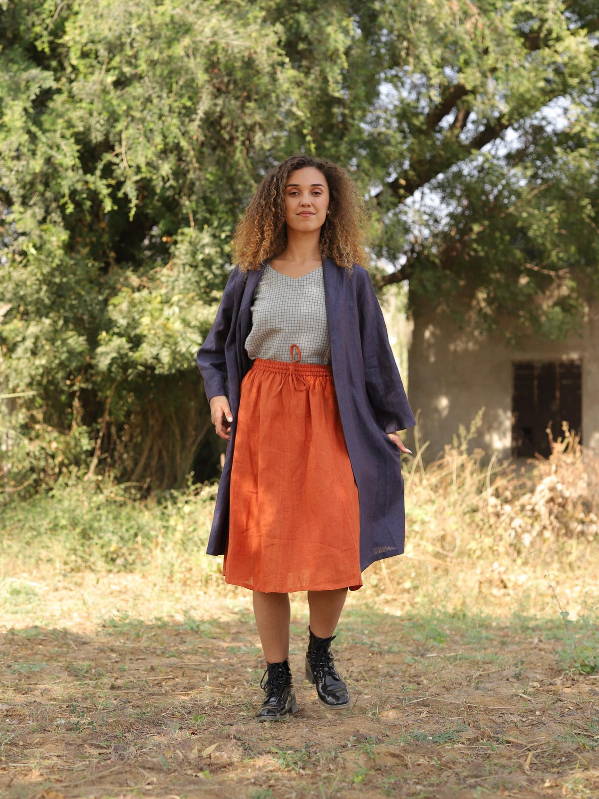 Long Linen Duster Coat in navy blue linen, front, hands in pockets