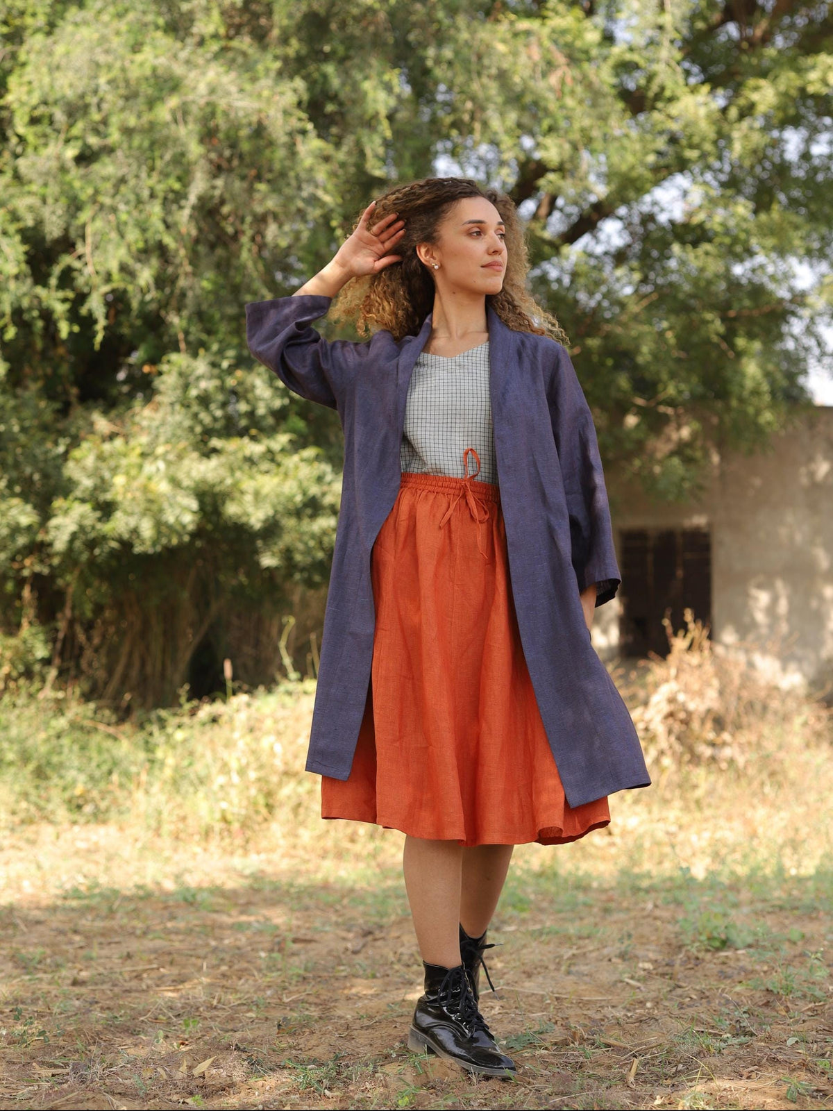Long Linen Duster Coat in navy blue linen, side, sleeve raised