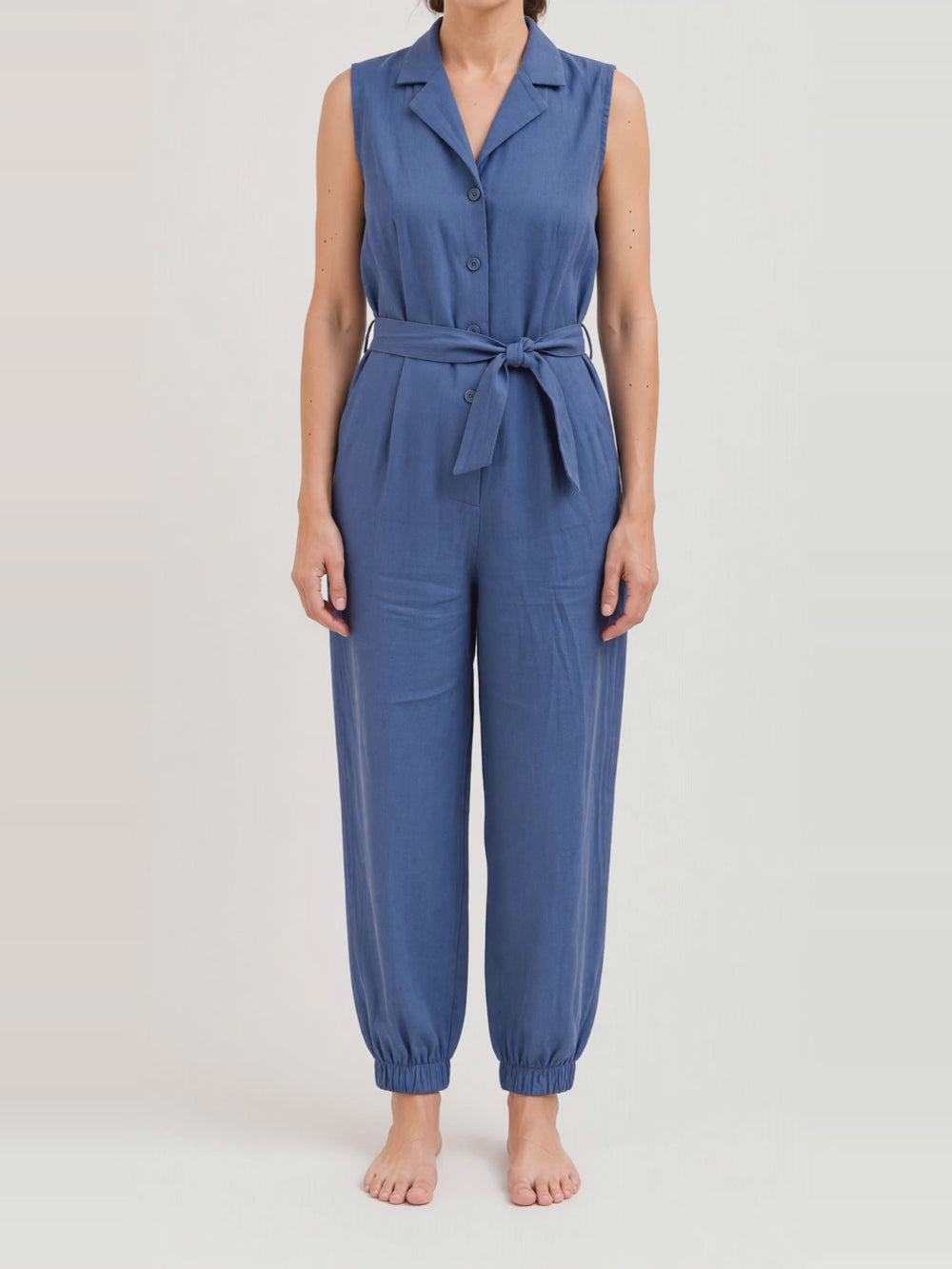 Sleeveless Linen Jumpsuit, turning in the studio