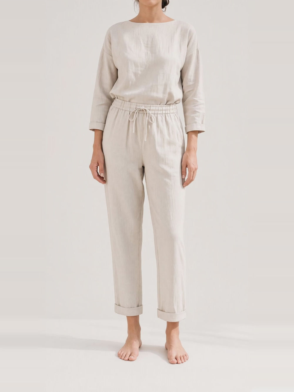 Tapered Linen Trousers, turning in the studio
