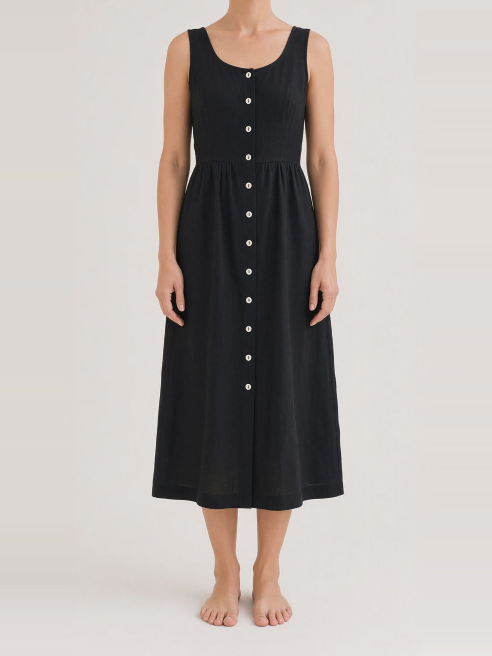 Button Front Linen Midi in black, turning in the studio