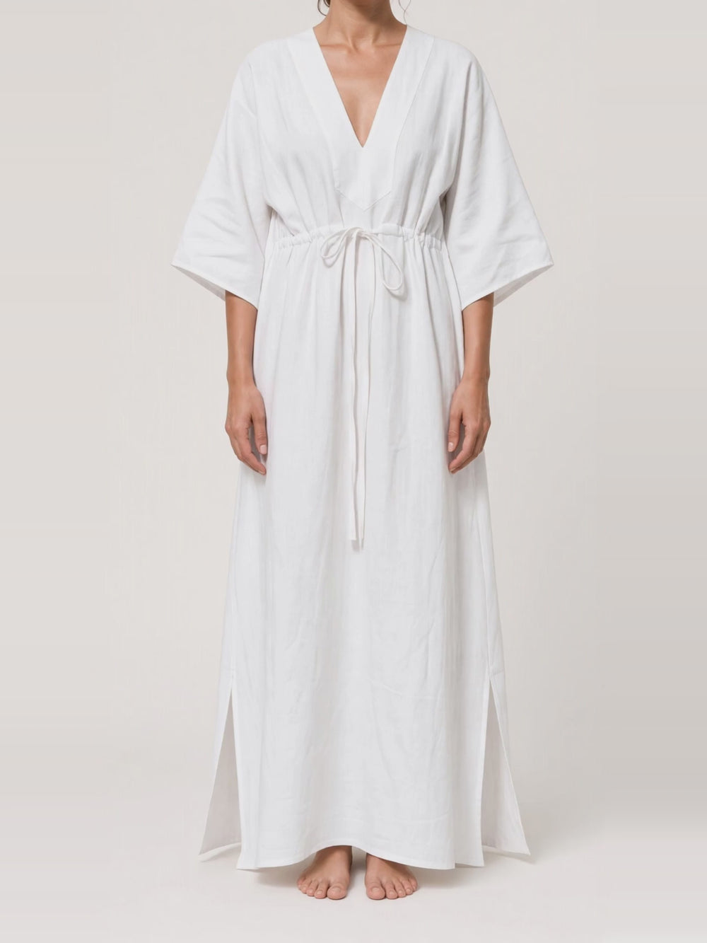 Batwing Linen Kaftan in white, turning in the studio