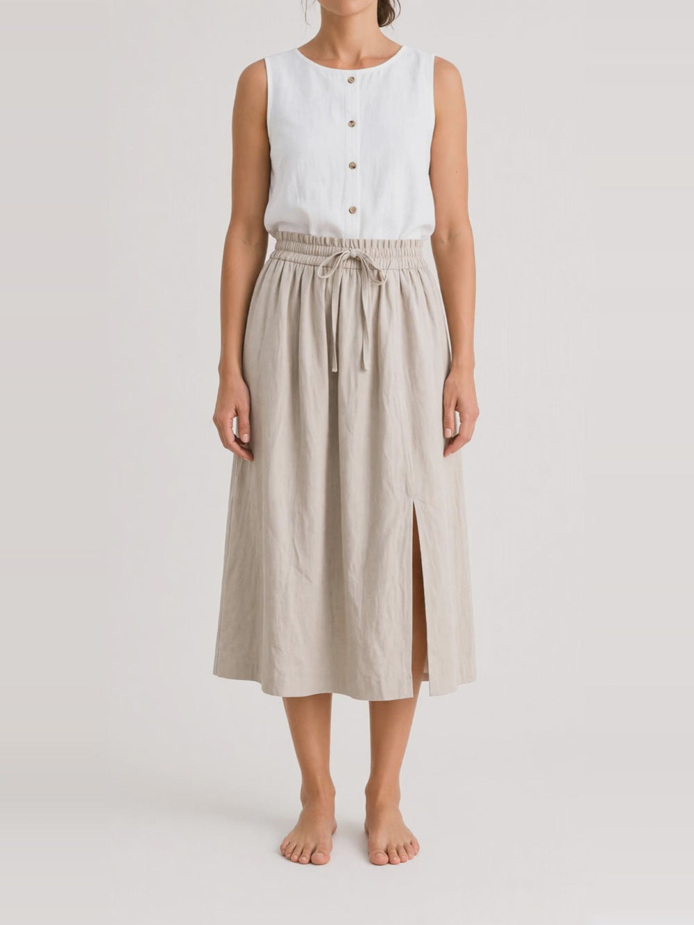 Gathered Linen Midi Skirt in natural, turning in the studio